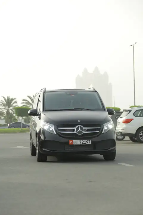 A black Mercedes-Benz V-Class head-on