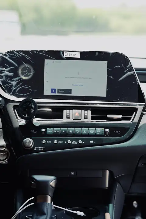 The dashboard and screen of a Lexus