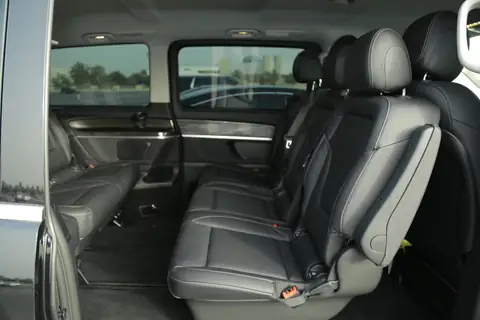 The rear cabin of a Mercedes-Benz V-Class in black leather