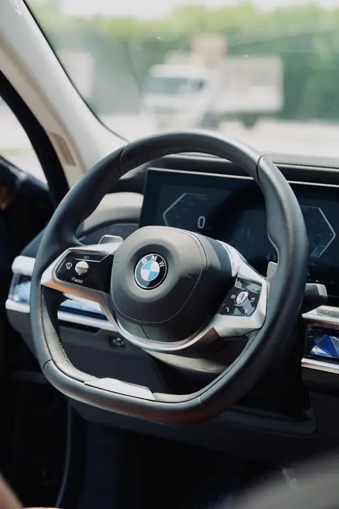 The steering wheel and dashboard of a BMW