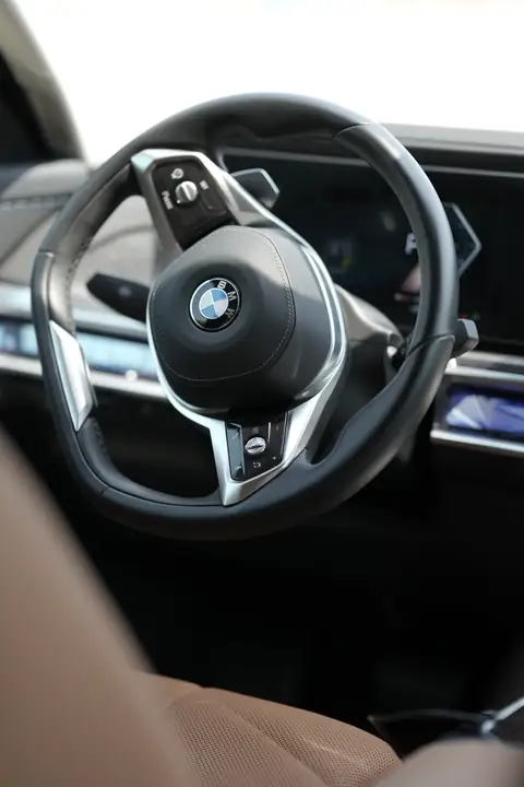 The steering wheel of a BMW 7 Series, close up