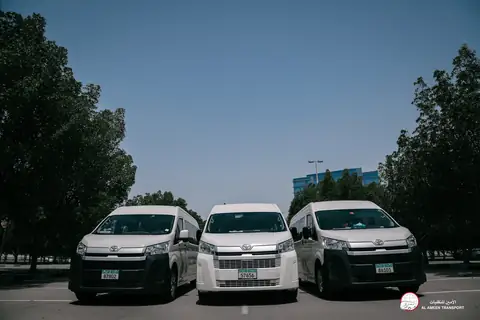 Three white vans with their fronts to the camera